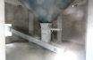 Hopper inside wet silo.